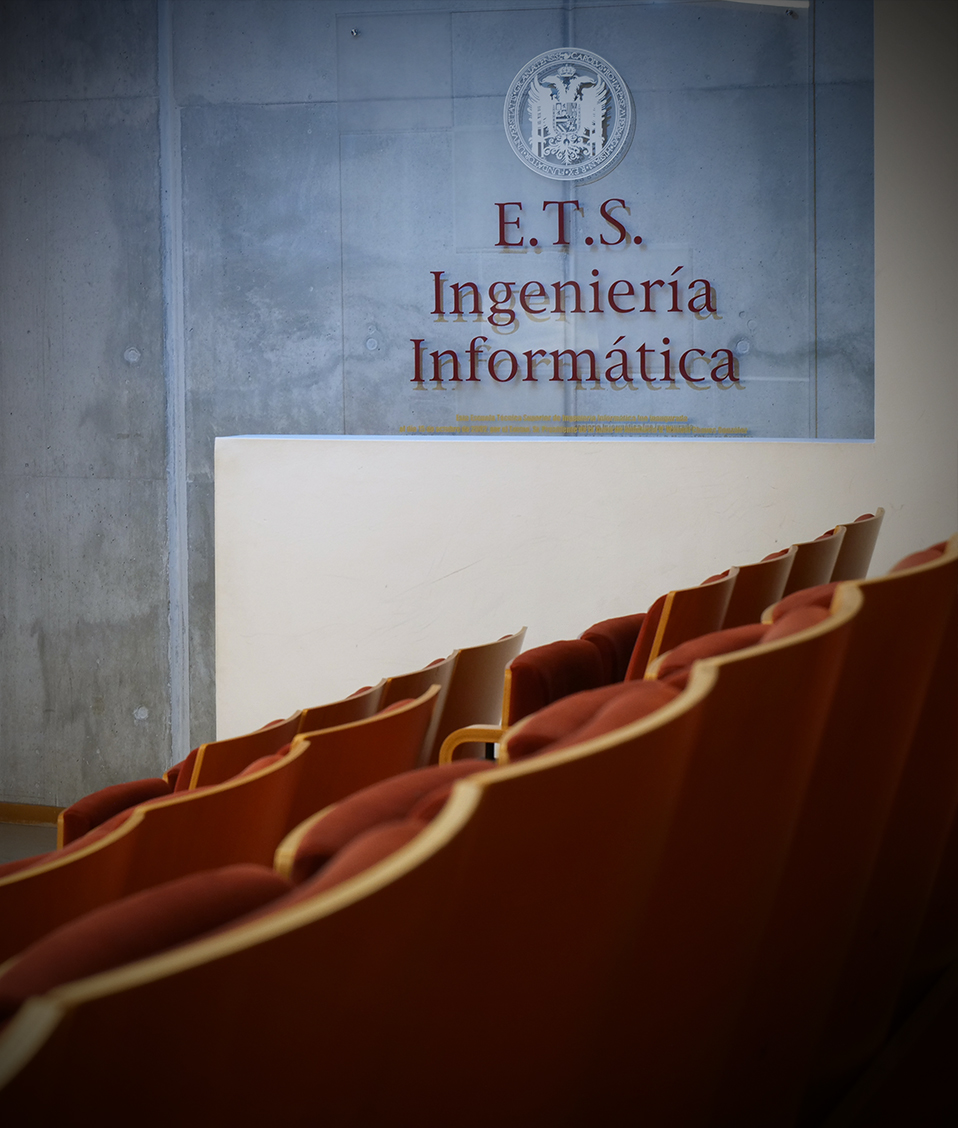 Cartel de la Escuela Técnica Superior de Ingeniería Informática en el Salón de Actos de la Facultad